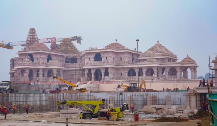 A construction crew works on Ayodhya Ram Mandir on Tuesday, January 16, 2024